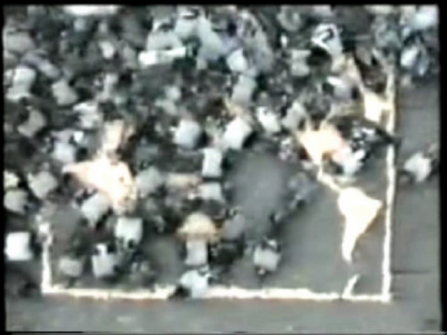 Michele Chiossi OMAGGIO a A e B (still), 1996 8 mm masterizzato su DVD  Format DVD  Running Time: 05:00 mins video Alighiero Boetti mappa del mondo tributo omaggio piccioni piazza italiana mais